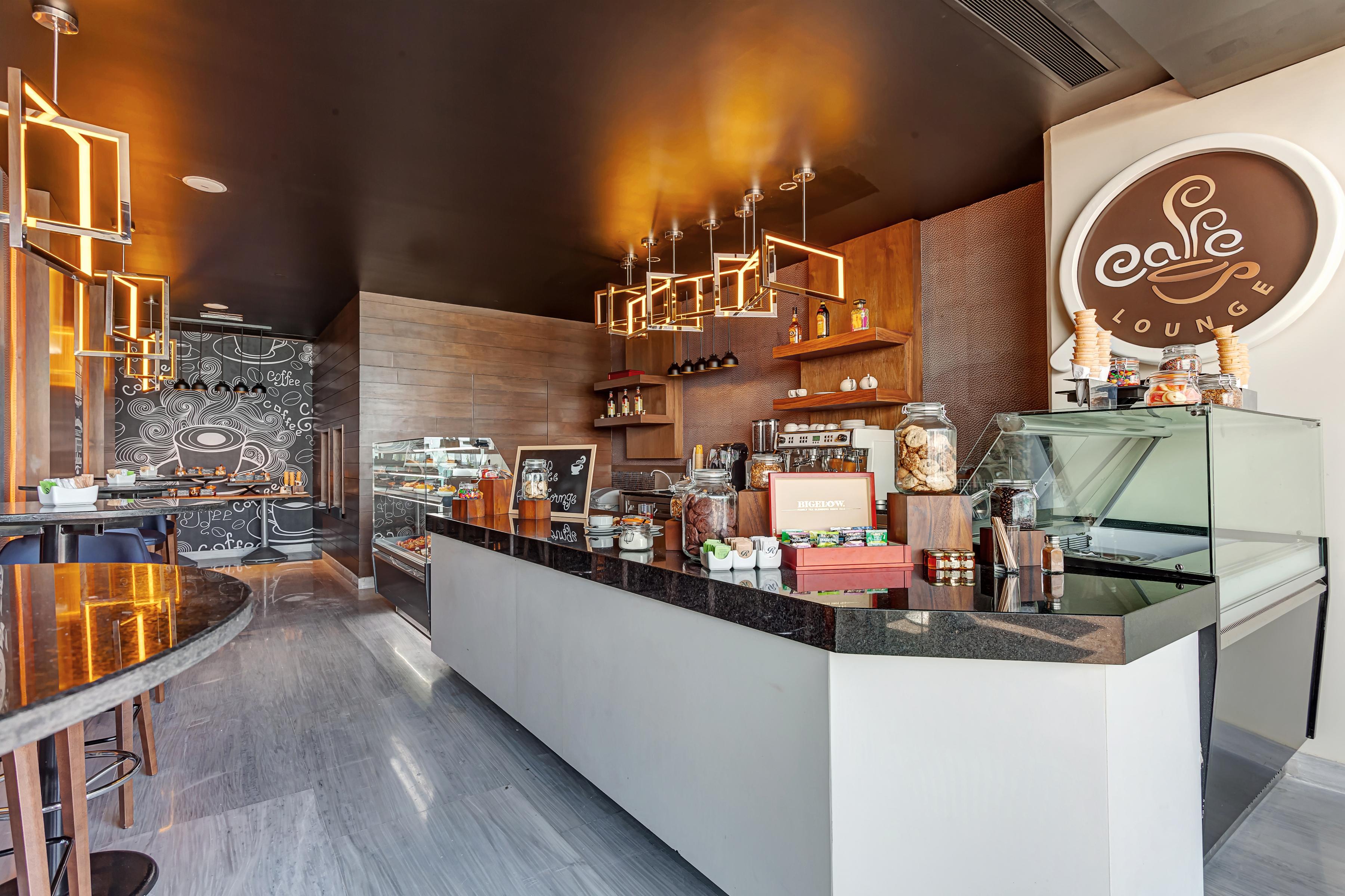 Royalton Chic Cancun, An Autograph Collection All-Inclusive Resort - Adults Only ภายนอก รูปภาพ The interior of a typical café